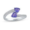 Thumbnail Image 0 of 5.0mm Trillion-Cut Tanzanite and 0.086 CT. T.W. Diamond Bypass Wrap Ring in 10K White Gold