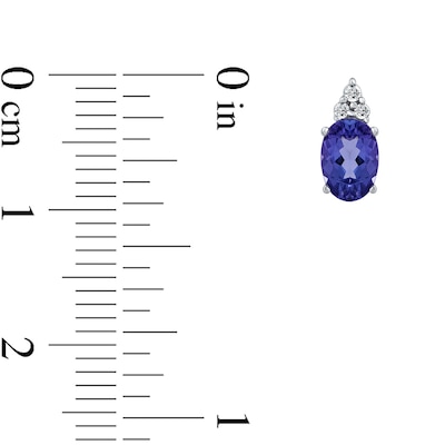 Oval Tanzanite and 0.04 CT. T.W. Diamond Tri-Top Stud Earrings in 10K White Gold