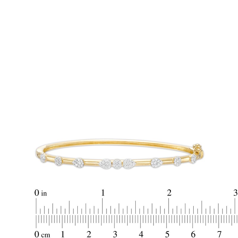 0.50 CT. T.W. Pear-Shaped and Round Multi-Diamond Station Bangle in 10K Gold