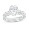 1.70 CT. T.W. Certified Oval Lab-Grown Diamond Frame Bridal Set in 14K White Gold (F/SI2)