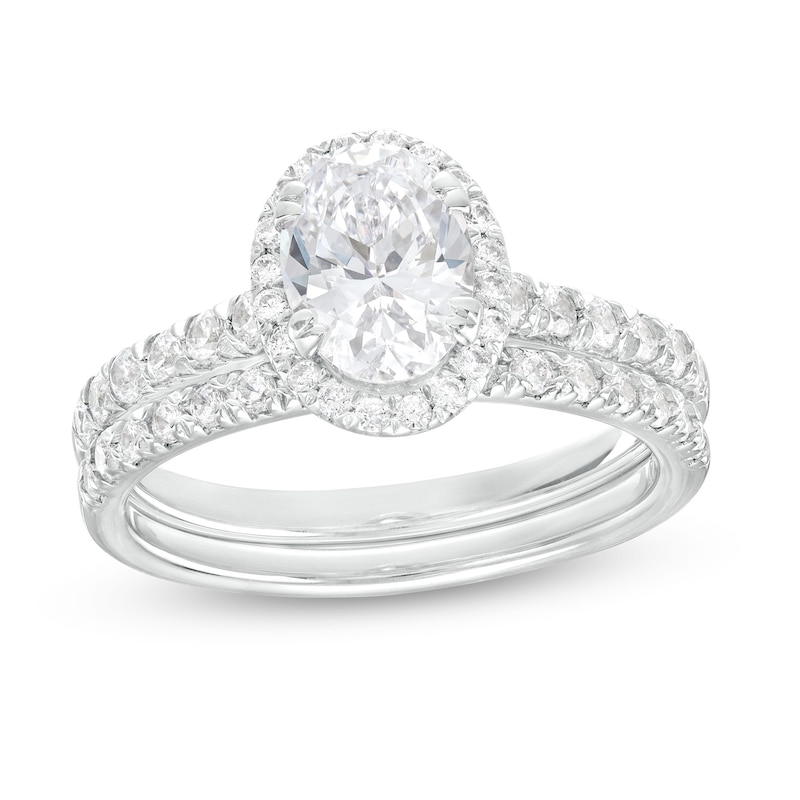 1.70 CT. T.W. Certified Oval Lab-Grown Diamond Frame Bridal Set in 14K White Gold (F/SI2)