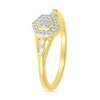0.115 CT. T.W. Baguette and Round Diamond Flower Frame Promise Ring in 10K Gold