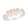Thumbnail Image 1 of 0.115 CT. T.W. Diamond Interlocking Hearts Split Shank Promise Ring in Sterling Silver and 14K Rose Gold Plate