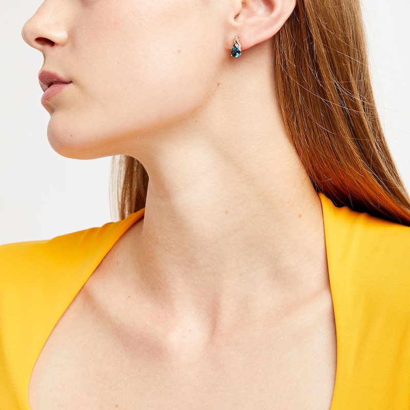Main Image 2 of Pear-Shaped London Blue Topaz and 0.067 CT. T.W. Diamond "V" Drop Earrings in 10K Gold