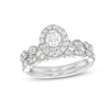 Thumbnail Image 0 of 0.70 CT. T.W. Oval Diamond Frame Vintage-Style Bridal Set in 14K White Gold (I/I1)