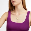 Oval Opal and 0.21 CT. T.W. Diamond Edge Medallion Pendant in 10K Gold