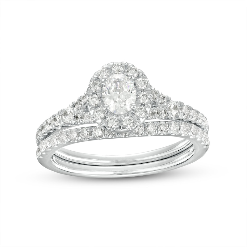 Main Image 1 of 0.95 CT. T.W. Oval Diamond Frame Bridal Set in 14K White Gold (I/I1)