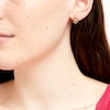 Thumbnail Image 1 of Unstoppable Love™ 0.10 CT. T.W. Diamond Dangle Flame Stud Earrings in 10K Gold
