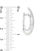 Thumbnail Image 3 of Unstoppable Love™ 0.10 CT. T.W. Diamond Line Illusion Hoop Earrings in Sterling Silver