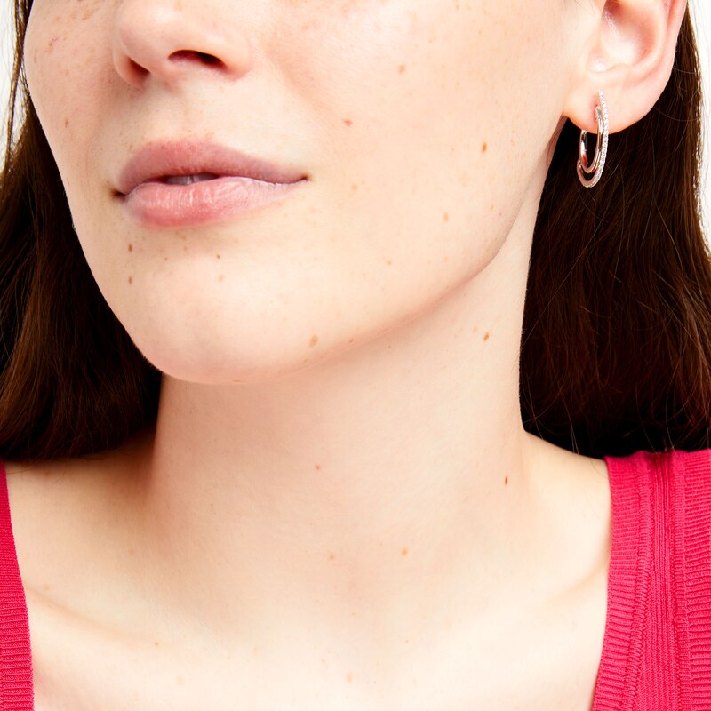 Main Image 2 of Unstoppable Love™ 0.50 CT. T.W. Diamond Line Illusion Hoop Earrings in 10K White Gold
