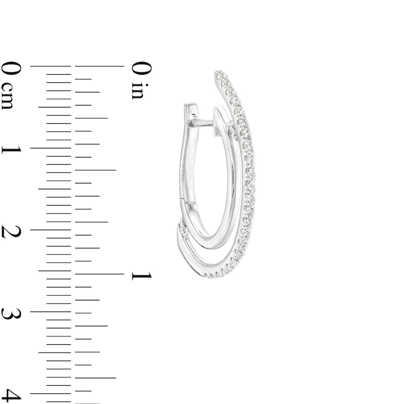 Main Image 3 of Unstoppable Love™ 0.50 CT. T.W. Diamond Line Illusion Hoop Earrings in 10K White Gold