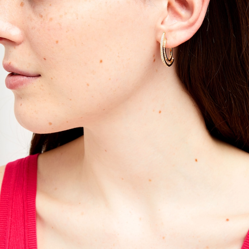 Main Image 2 of Unstoppable Love™ 0.50 CT. T.W. Diamond Line Illusion Hoop Earrings in 10K Gold