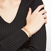 Thumbnail Image 1 of Italian Brilliance™ Oval Infinity Braid Bracelet in Solid 14K Gold - 7.5"