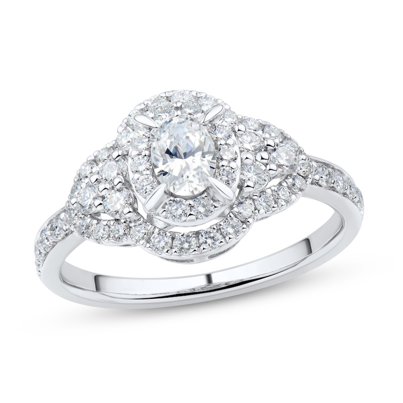 0.95 CT. T.W. Oval Diamond Clover Frame Tri-Sides Ring in 14K White Gold (I/I1)