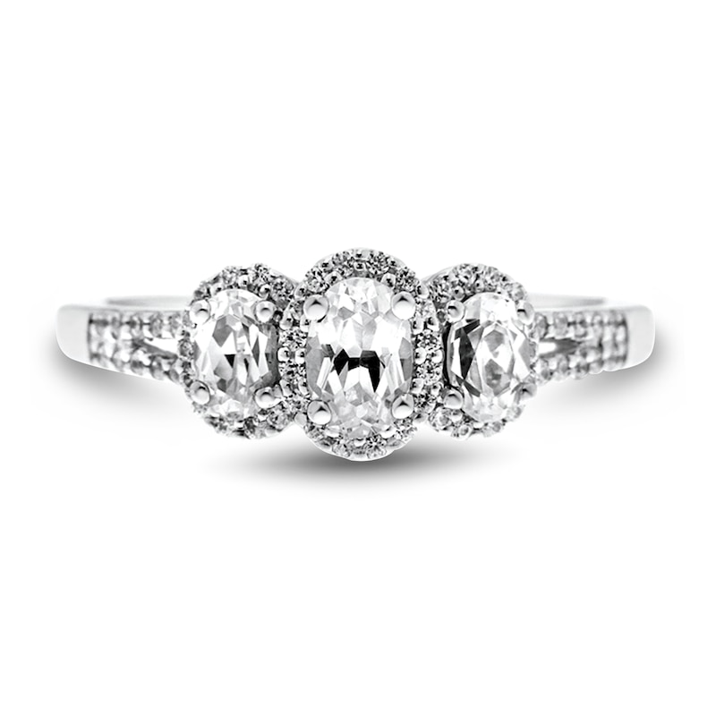 0.95 CT. T.W. Oval Diamond Frame Three Stone Split Shank Engagement Ring in 14K White Gold (I/I1-SI2)