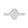 Thumbnail Image 4 of Vera Wang Love Collection Canadian Certified Oval Centre Diamond 0.95 CT. T.W. Frame Engagement Ring in 14K White Gold