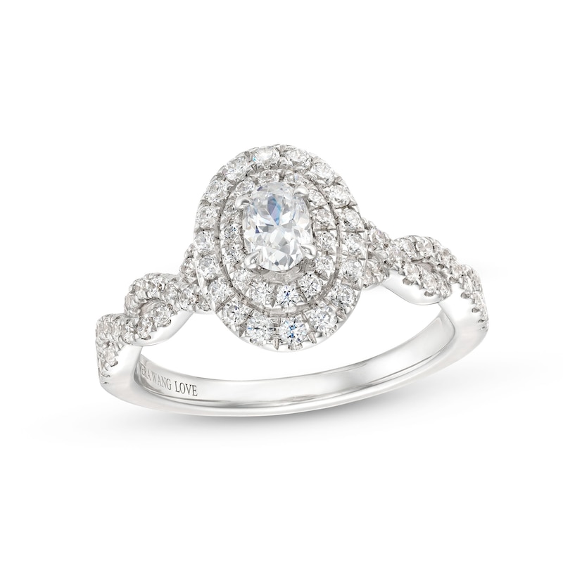 Vera Wang Love Collection Canadian Certified Oval Centre Diamond 0.69 CT. T.W. Twist Engagement Ring in 14K White Gold|Peoples Jewellers