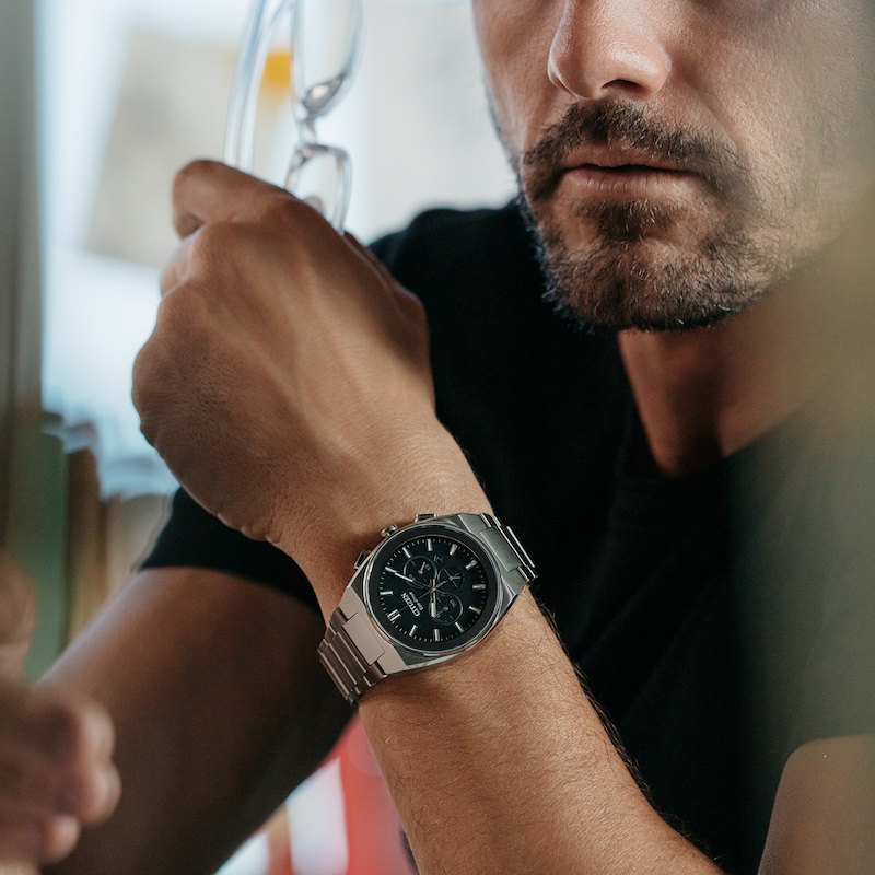 Men's Citizen Eco-Drive® Axiom Chronograph Silver-Tone Watch with Black Dial (Model: CA4580-50E)