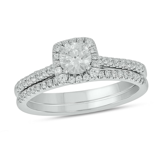 0.73 CT. T.W. Diamond Cushion Frame Hidden Infinity Bridal Set in 10K White Gold