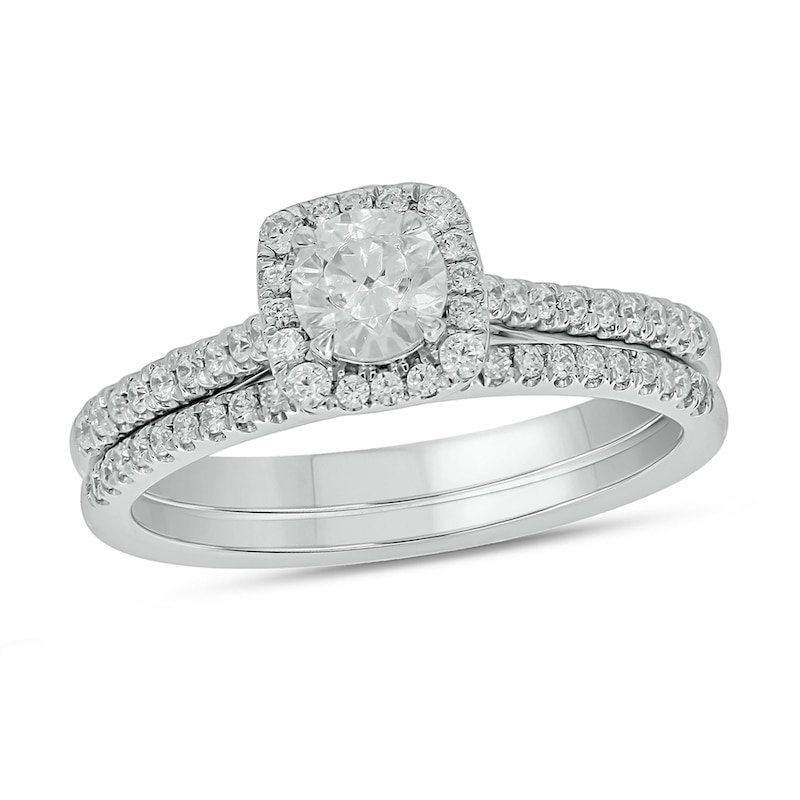0.73 CT. T.W. Diamond Cushion Frame Hidden Infinity Bridal Set in 10K White Gold