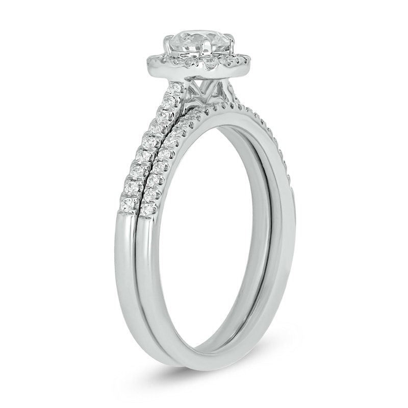 0.73 CT. T.W. Diamond Cushion Frame Hidden Infinity Bridal Set in 10K White Gold