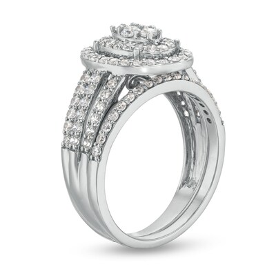 0.95 CT. T.W. Oval Multi-Diamond Triple Row Split Shank Bridal Set in 10K Gold