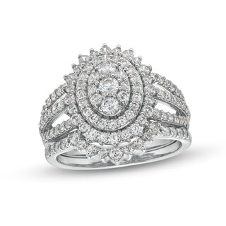 1.23 CT. T.W. Oval Multi-Diamond Sunburst Frame Split Shank Bridal Set in 10K Gold