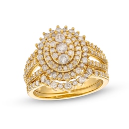 1.23 CT. T.W. Oval Multi-Diamond Sunburst Frame Split Shank Bridal Set in 10K Gold