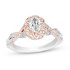 Thumbnail Image 1 of Enchanted Disney Rapunzel 0.69 CT. T.W. Oval Diamond Braid Frame Engagement Ring in 14K Two-Tone Gold (I/I1)