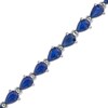 Thumbnail Image 1 of Sideways Pear-Shaped Blue Sapphire Bracelet in 10K White Gold - 7.25&quot;