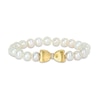 Thumbnail Image 0 of Eternally Bonded 7.0-7.5mm Cultured Freshwater Pearl Strand and 0.05 CT. T.W. Diamond Bow Stretch Bracelet with 10K Gold