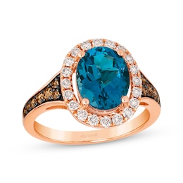 Le Vian® Oval Deep Sea Blue Topaz™ and 0.50 CT. T.W. Diamond Frame Ring in 14K Strawberry Gold®