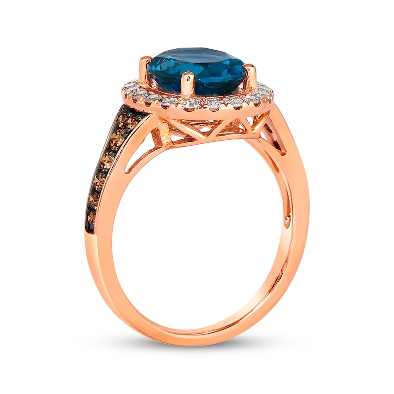 Le Vian® Oval Deep Sea Blue Topaz™ and 0.50 CT. T.W. Diamond Frame Ring in 14K Strawberry Gold®