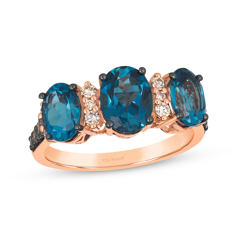 Le Vian® Oval Deep Sea Blue Topaz™ and 0.25 CT. T.W. Diamond Three Stone Ring in 14K Strawberry Gold®