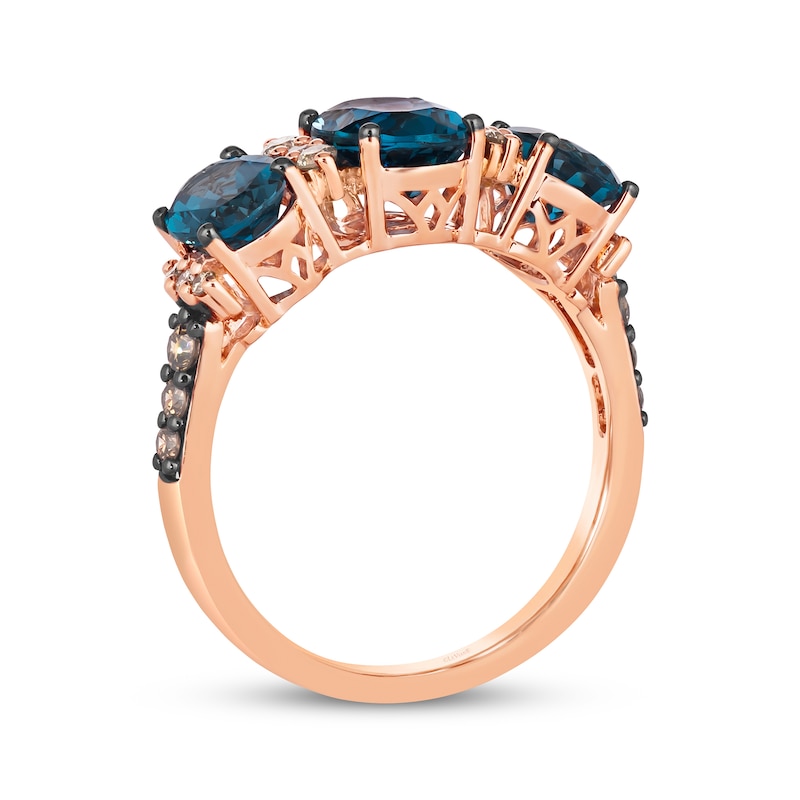 Le Vian® Oval Deep Sea Blue Topaz™ and 0.25 CT. T.W. Diamond Three Stone Ring in 14K Strawberry Gold®