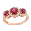 Thumbnail Image 1 of Rhodolite Garnet and 0.30 CT. T.W. Diamond Frame Three Stone Ring in 10K Rose Gold