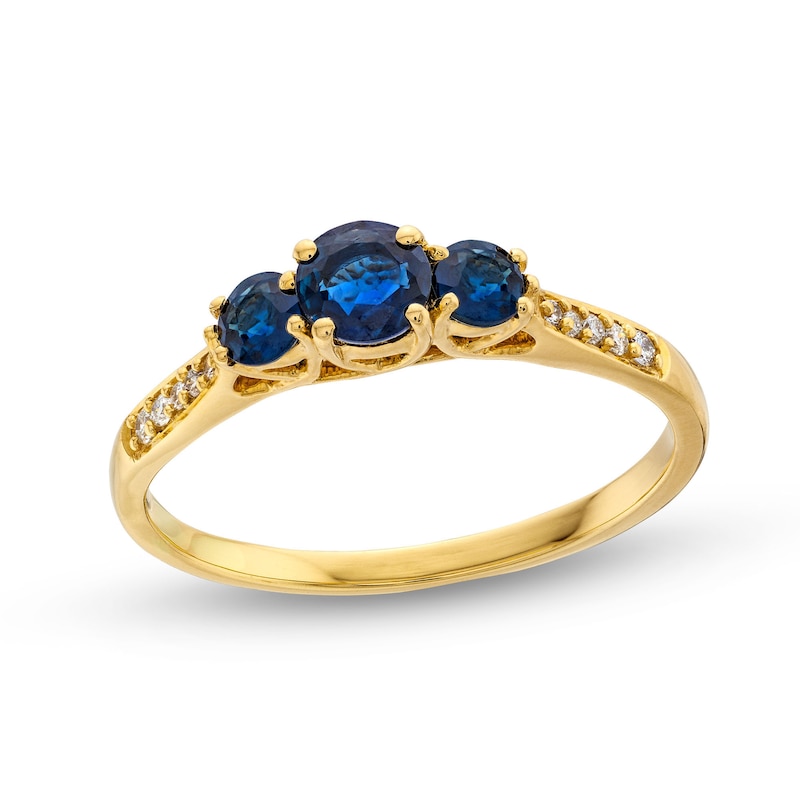Blue Sapphire and 0.04 CT. T.W. Diamond Three Stone Ring in 10K Gold