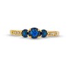 Blue Sapphire and 0.04 CT. T.W. Diamond Three Stone Ring in 10K Gold