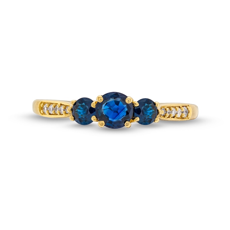 Blue Sapphire and 0.04 CT. T.W. Diamond Three Stone Ring in 10K Gold