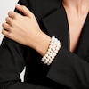 Thumbnail Image 1 of 8.3-9.3mm Oval Cultured Freshwater Pearl Triple Row Stretch Bracelet