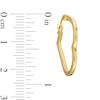 Heart-Shaped Hoop Earrings in Hollow 10K Gold