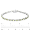 Thumbnail Image 4 of Oval Peridot and White Lab-Created Sapphire  Line Bracelet in Sterling Silver - 7.25"