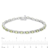 Thumbnail Image 3 of Oval Peridot and White Lab-Created Sapphire  Line Bracelet in Sterling Silver - 7.25"