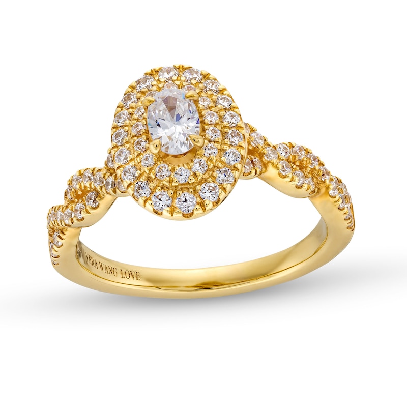 Main Image 1 of Vera Wang Love Collection Canadian Certified Oval Centre Diamond 0.69 CT. T.W. Twist Shank Engagement Ring in 14K Gold