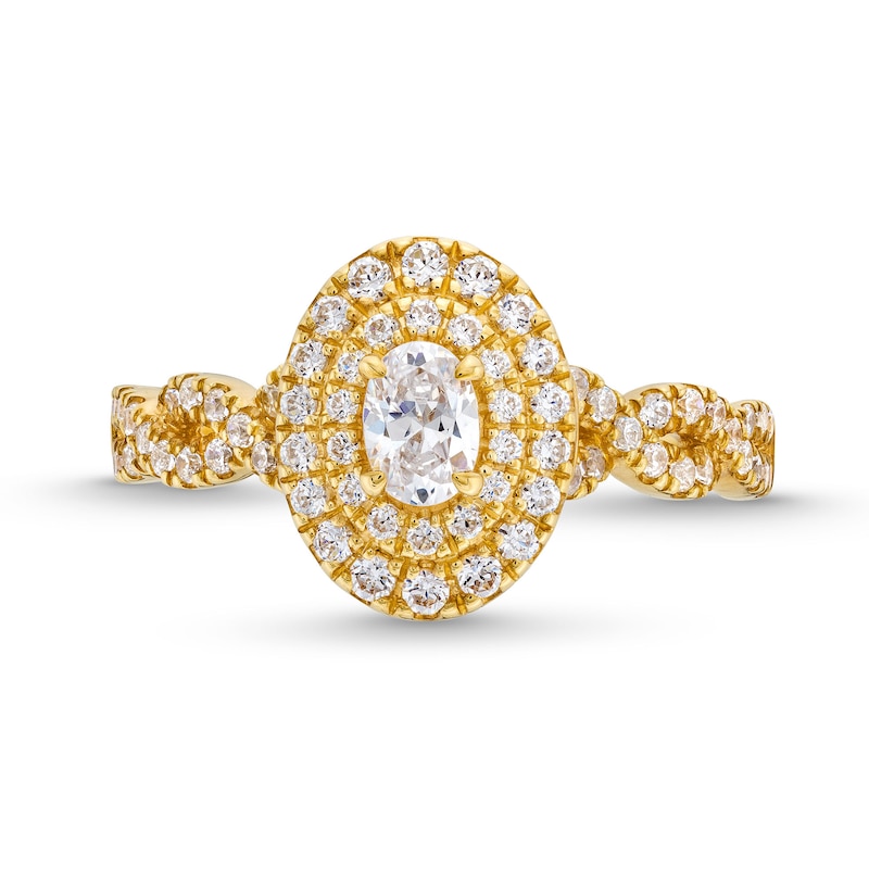 Main Image 4 of Vera Wang Love Collection Canadian Certified Oval Centre Diamond 0.69 CT. T.W. Twist Shank Engagement Ring in 14K Gold
