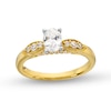 Thumbnail Image 0 of 0.69 CT. T.W. Oval Diamond Leaf-Sides Engagement Ring in 14K Gold