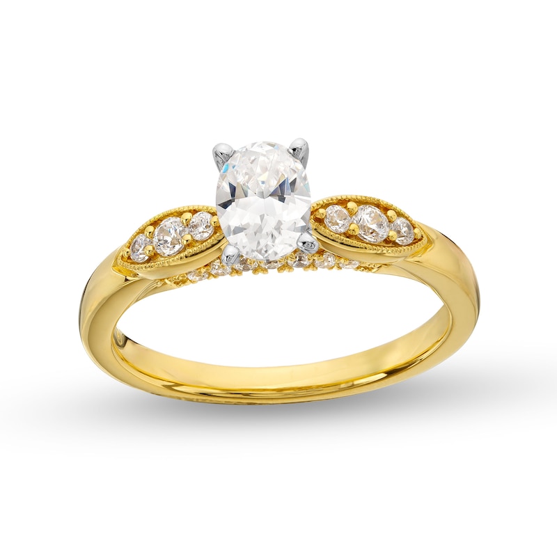 0.69 CT. T.W. Oval Diamond Leaf-Sides Engagement Ring in 14K Gold