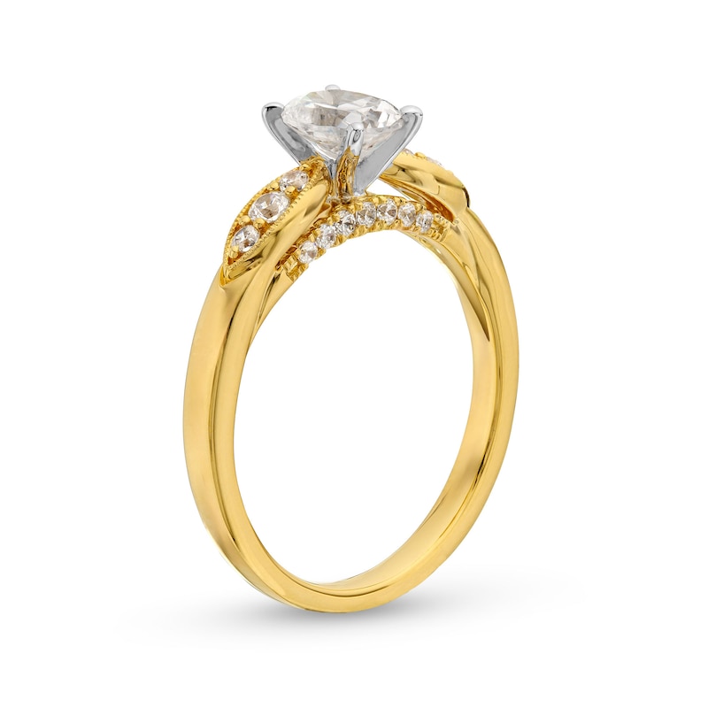 0.69 CT. T.W. Oval Diamond Leaf-Sides Engagement Ring in 14K Gold