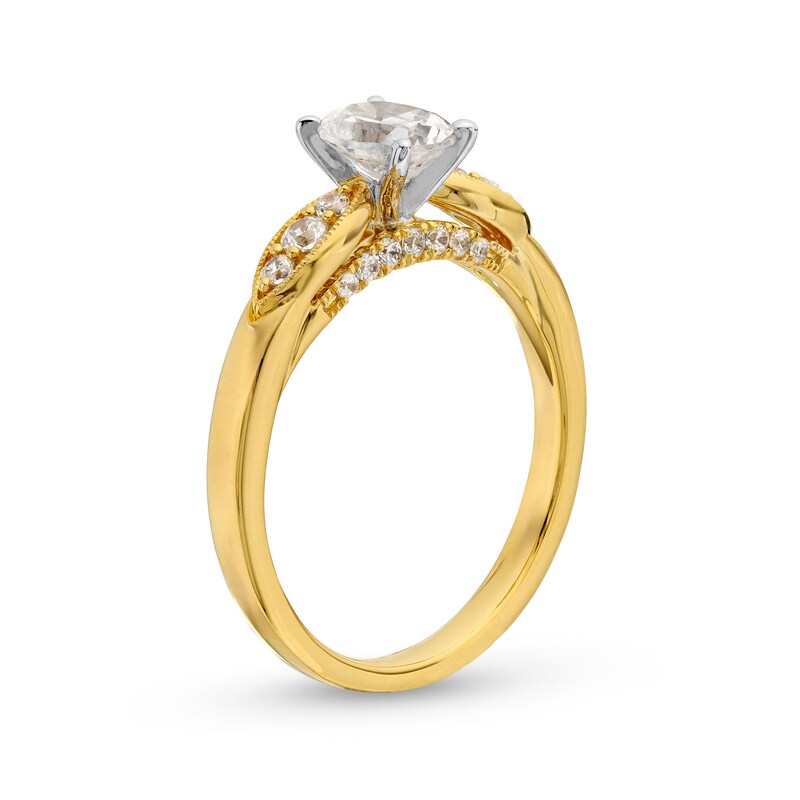 0.69 CT. T.W. Oval Diamond Leaf-Sides Engagement Ring in 14K Gold