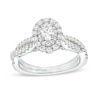 Thumbnail Image 0 of Vera Wang Love Collection 0.95 CT. T.W. Oval Diamond Double Frame Twist Shank Engagement Ring in 14K White Gold
